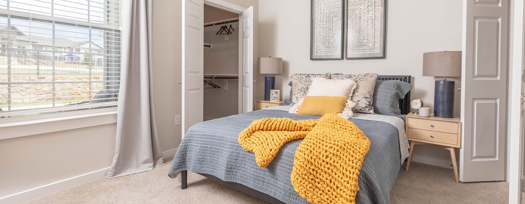 bedroom with bed and large window